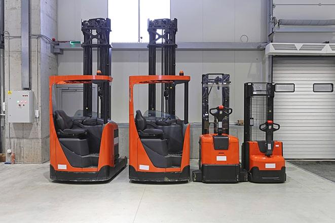 forklifts parked in a manufacturing plant